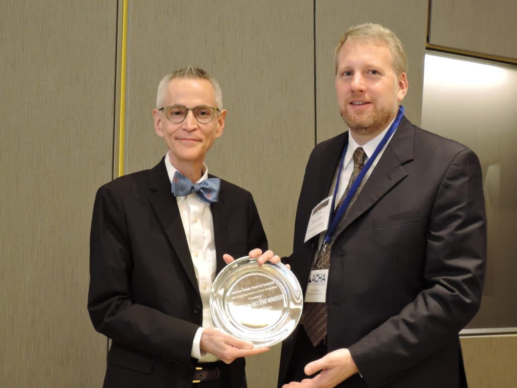 2016 ACHA President Liam Brockey presenting the Distinguished Scholar Award to Professor Walter Melion of Emory University